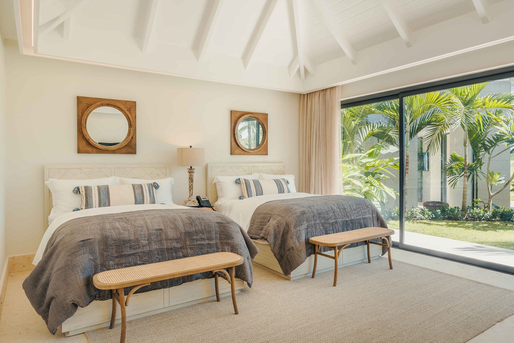 Villa at a Punta Cana resort — bedroom with custom furniture and tropical details by SOMMA
